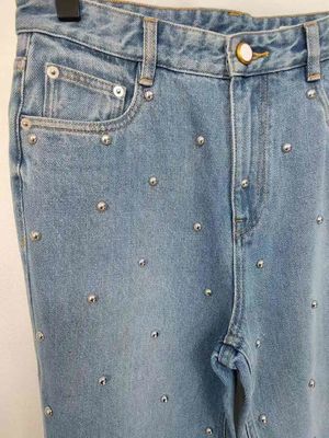Star like studs on the legs Denim Bottom for a unique, standout look
