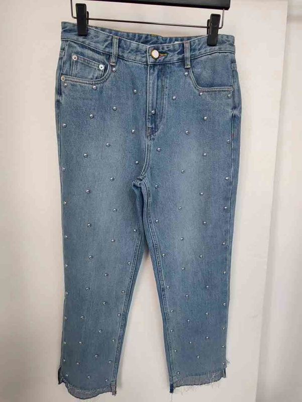 Star like studs on the legs Denim Bottom for a unique, standout look